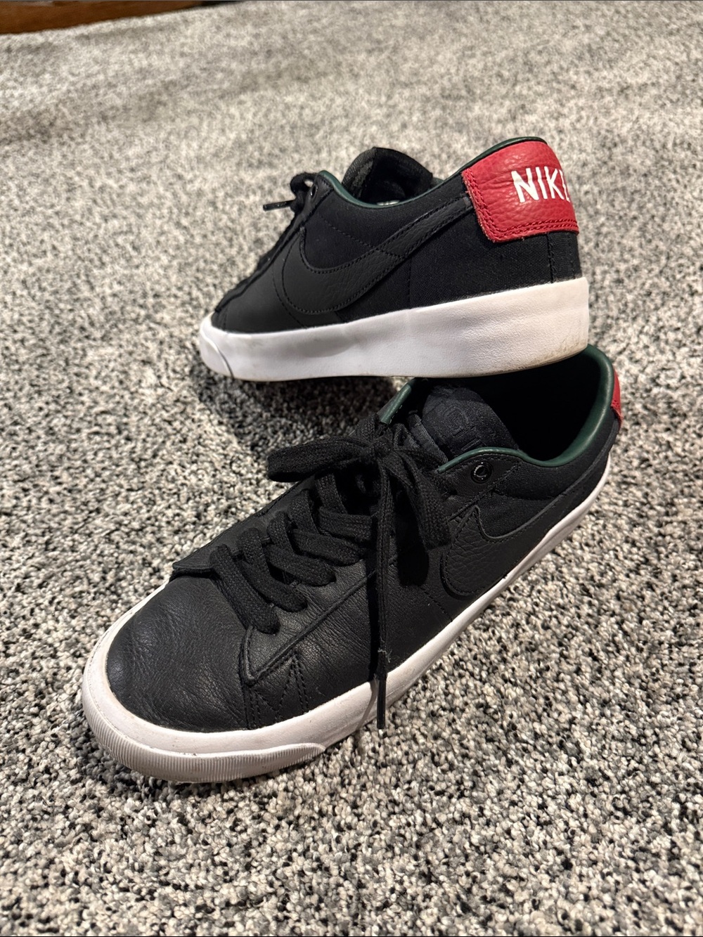 Nike Men’s Black Low-Top Sneakers with Red Heel Tab